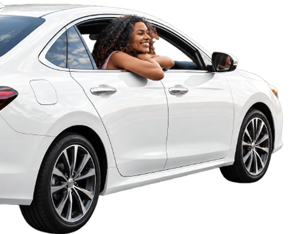 Smiling Weelbaro rider beside a car